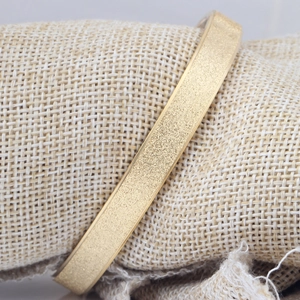 8mm frosted 18K gold plated stainless steel bangle with a matte sandblast finish