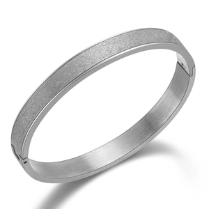 Fashion 8mm frosted silver stainless steel bangle with a secure snap closure for unisex wear