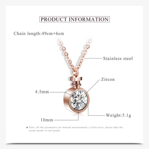 Detail view of 10mm rose gold perfume bottle necklace showing size and stainless steel material