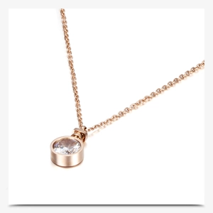 Detail view of 10mm perfume bottle pendant necklace with sparkling crystal in rose gold