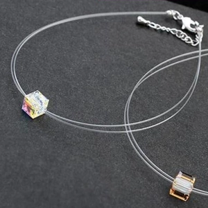 Minimalist clear fishing line necklaces with iridescent crystal cube and rose gold ring