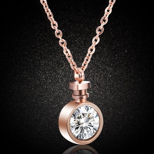 Rose gold perfume bottle pendant necklace with round sparkling crystal and cross chain