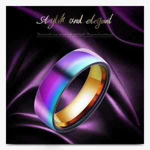 Close-up of 6mm rainbow stainless steel ring on purple silk with gold inner band