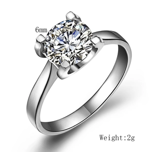 Detailed view of a 6mm zircon solitaire ring with 2g weight and classic 4-prong setting