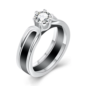 Modern 6mm black ceramic and silver ring with a sparkling round-cut center zircon gemstone