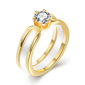 Modern 6mm white ceramic and gold plated ring featuring a sparkling central zircon stone