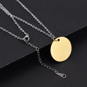 Polished 25mm round pendant on silver chain with lobster clasp and extension details