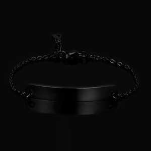 Close-up of sleek black stainless steel curved bar bracelet with polished finish