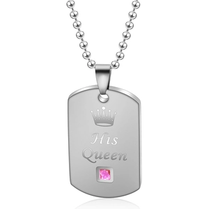 Detail of His Queen dog tag necklace with crown engraving and pink crystal inlay