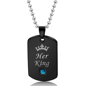 Detail of black matte rectangle tag necklace with Her King engraving and blue gemstone