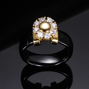 6MM black ceramic ring with golden flower motif and sparkling zircon stones on mirror