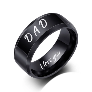 Close-up of black stainless steel DAD ring with I love you engraving on the inner band