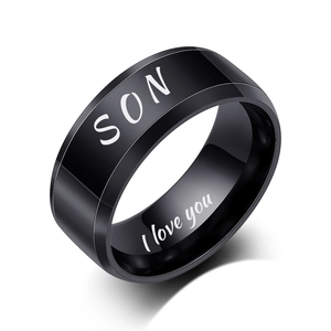 Detailed view of black polished steel ring engraved with SON and I love you message
