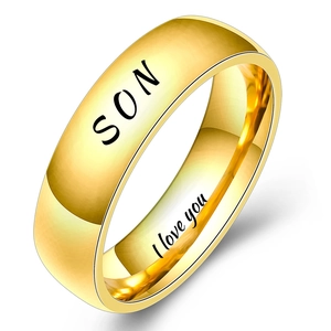 Macro shot of gold-plated ring with SON engraving and I love you message inside