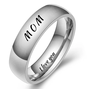 Macro detail of MOM engraving on polished silver stainless steel ring for mothers