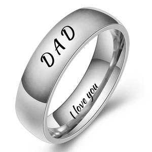 Close-up of polished silver DAD ring with I love you engraving on the inner band