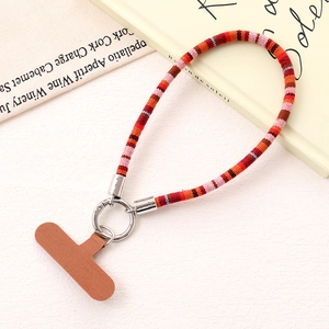 Ethnic style woven phone wrist strap with brown patch and silver spring ring connector