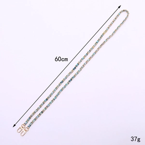 Golden woven metal chain strap with blue leather, 60cm length and lobster clasps