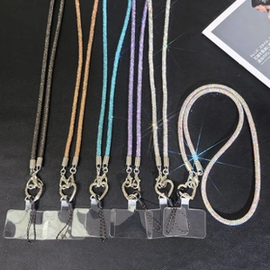 Close-up of sparkling rhinestone phone lanyards with heart-shaped metal clips in 6 colors