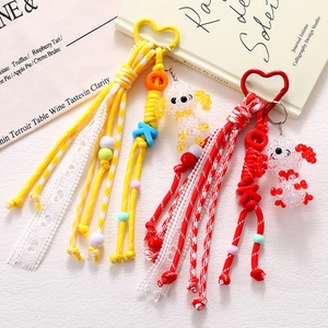 Handmade acrylic puppy bag charm with heart carabiner and colorful woven beads