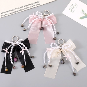 Elegant satin bow pendant with pearl chains and crystal drops for bags and phones