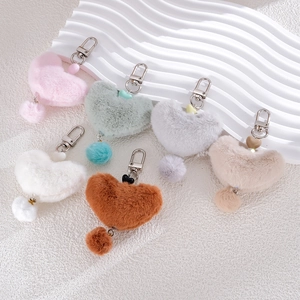 Furry heart-shaped keychains in six pastel colors with metal lobster clasps and beads
