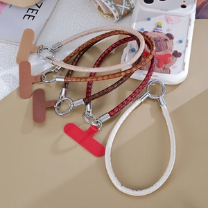 Detail of premium snakeskin texture braided phone wrist straps in four stylish colors