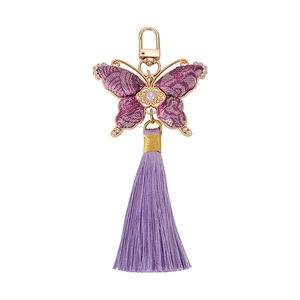 Pendentif papillon fait main en tissu jacquard violet avec bordures en cristaux brillants