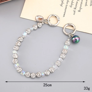 Handmade 25cm beaded phone strap with irregular pearls and smiley beads for bags
