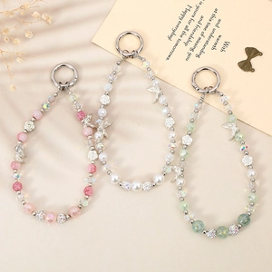 Handmade beaded phone charms with crystal butterflies and rose motifs in three colors