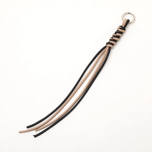 Handmade woven PU leather tassel keychain with silver metal ring in black and tan colors