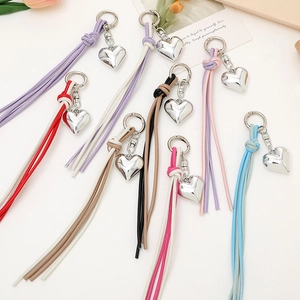 Colorful leather tassel keychains with heart pendants in silver mirror finish
