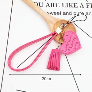 Pink PU leather phone strap with heart pendant and tassel, handmade 20cm keychain accessory