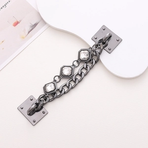 Detail of gun-black Cuban chain with square crystal accents for DIY phone cases