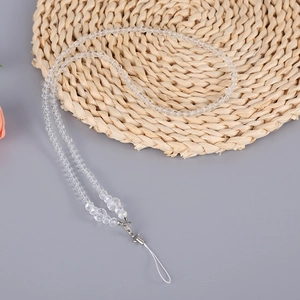 Detail of handmade clear crystal bead phone lanyard with polished silver metal clasp buckle