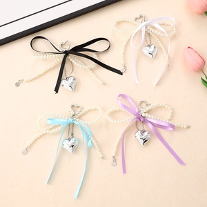Porte-clés Pendentif Cœur Nœud en Ruban Künstliche Perle Artificielle Ruban de Satin Alliage Cœur Bijou de Sac pour Femme Décoration