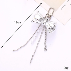 Silver bow keychain with pearls and metal chains for bags, length 12cm and weight 20g