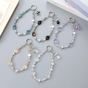 Five styles of luxury crystal beaded wristlet straps with tulip and bow charms for bags