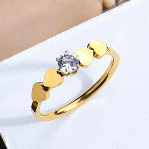 Elegant gold stainless steel heart ring with sparkling white zircon in minimalist design