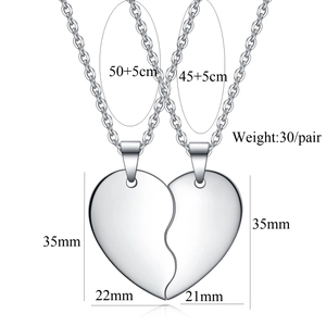 Detail showing 35mm stainless steel heart puzzle pendants with precise size measurements