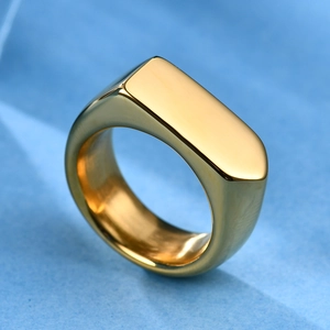 Macro view of a 9mm polished gold stainless steel signet ring with flat rectangular face