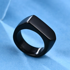 Detail view of a 9mm black stainless steel ring with flat rectangular geometric top