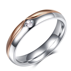 Modern two-tone stainless steel couple ring with rose gold line and center zircon stone