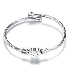Silver stainless steel cable wire bracelet featuring heart pendant with letter D engraving