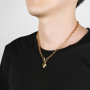 Gold stainless steel heart necklace with letter E and stylish OT toggle clasp