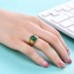 Bague vintage en acier inoxydable doré 18K avec une pierre œil de tigre verte ovale