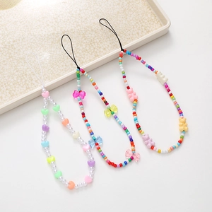 Colorful handmade beaded phone charms with heart, bow, and bear beads for women accessories