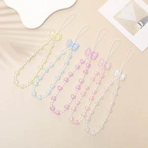 Pastel heart beaded phone charms with ribbon bow in light blue pink and yellow