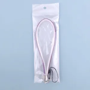 Luxury white phone wrist strap with sparkling purple rhinestones and silver metal clasp