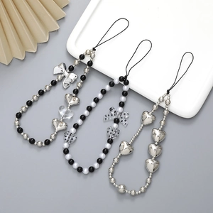 Creative bow and heart charm phone chains with silver beads and polka dot accents